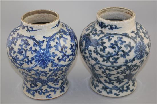 A pair of Chinese blue and white crackle glaze baluster vases, late 19th / early 20th century, 22cm